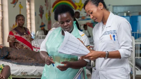 Physician consults with patient 