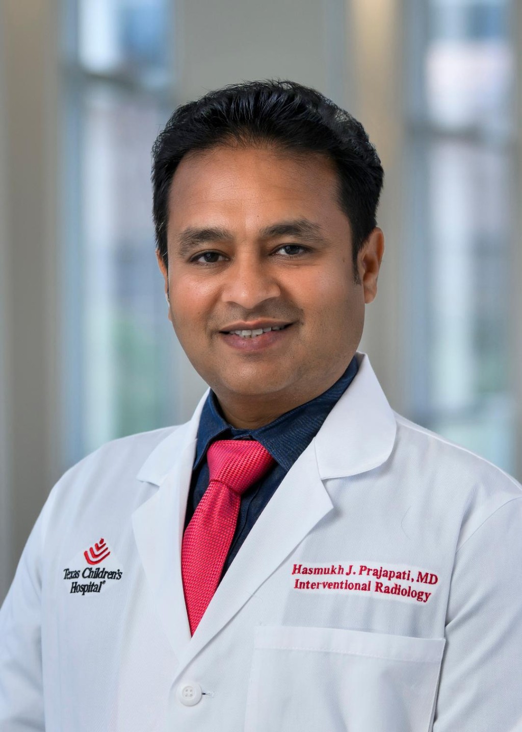 Hasmukh J. Prajapati MD, DNB(India), DABR, FSIR